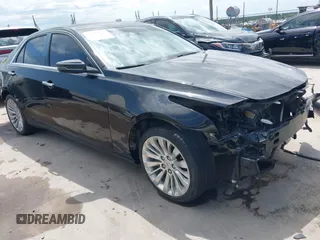 2014 Cadillac CTS Vsport RWD z VIN 1G6AU5S84E0149790, wystawiony jako IAAI lot #42369928 z przebiegiem 96 715 mil mil oraz . Historia ofert i sprzedaży dostępna na DreamBid. Obrazek 1.