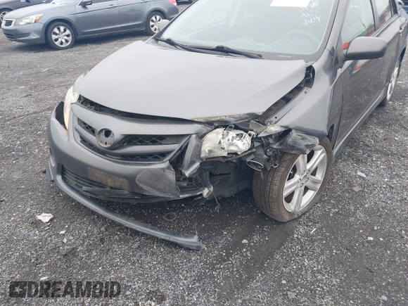 2013 Toyota Corolla L with VIN 2T1BU4EE7DC061656, listed as a IAAI auction lot 42169502 with 182,402 mi miles and . Bid and sale history available at DreamBid. Image 6.