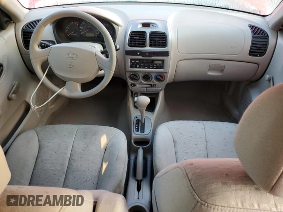 2005 Hyundai Accent GLS with VIN KMHCG45C15U596671, listed as a Copart auction lot 74834004 with 0 mi miles and Salvage Title. Bid and sale history available at carsss.com. Image 8.