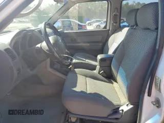 2002 Nissan Frontier SE z VIN 1N6ED27T42C319065, wystawiony jako Copart lot #74206474 z przebiegiem 147 724 mil mil oraz Szkoda całkowita • Salvage title. Historia ofert i sprzedaży dostępna na DreamBid. Obrazek 7.