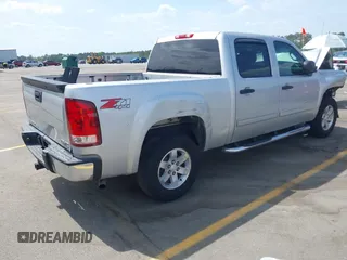 2012 GMC Sierra 1500 SLE with VIN 3GTP2VE71CG257499, listed as a IAAI auction lot 42074272 with 211,038 mi miles and . Bid and sale history available at DreamBid. Image 4.