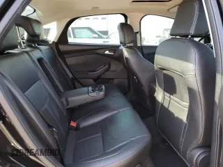 2016 Ford Focus Titanium with VIN 1FADP3J22GL201721, listed as a Copart auction lot 50633795 with 29,801 mi miles and Salvage title. Bid and sale history available at DreamBid. Image 10.