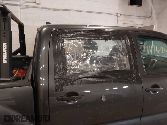 2014 Toyota Tacoma with VIN 3TMLU4EN3EM151917, listed as a IAAI auction lot 41769083 with 216,910 mi miles. Bid and sale history available at carsss.com. Image 6.
