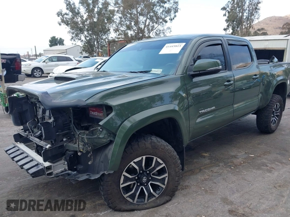 2021 Toyota Tacoma 4WD SR5 with VIN 3TMDZ5BN0MM116198, listed as a IAAI auction lot 41445815 with 59,561 mi miles. Bid and sale history available at carsss.com. Image 18.