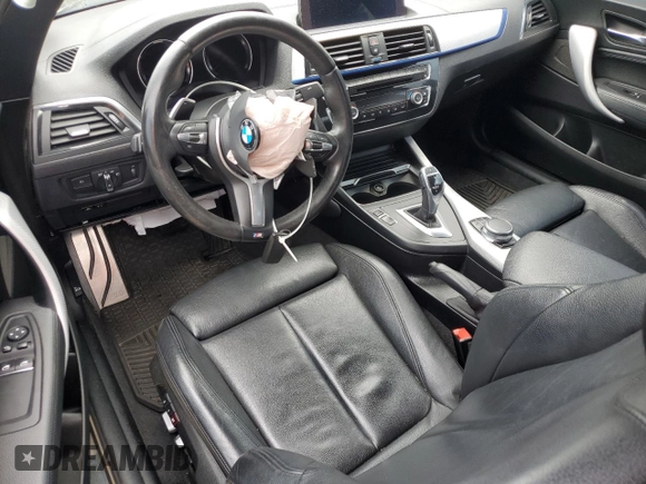 2018 BMW 2 Series 230i xDrive with VIN WBA2J3C54JVA49821, listed as a Copart auction lot 61046555 with 51,167 mi miles and Salvage title. Bid and sale history available at DreamBid. Image 8.