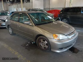2003 Honda Civic Hybrid with VIN JHMES95613S031198, listed as a IAAI auction lot 40508590 with 276,815 mi miles. Bid and sale history available at carsss.com. Image 1.