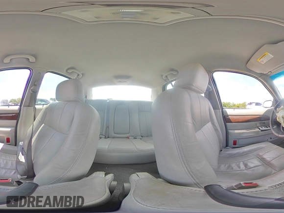 2003 Mercury Grand Marquis LS Premium с VIN 2MEFM75WX3X665058, выставлен на аукционе Copart как лот 55266225 с пробегом 120 904 миль миль и Списание • Salvage title. История ставок и продаж доступна на DreamBid. Изображение 14.