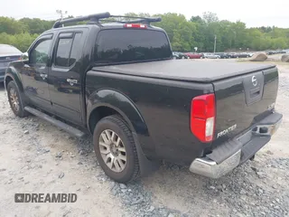 2011 Nissan Frontier Pro-4X with VIN 1N6AD0EV9BC451293, listed as a IAAI auction lot 42286309 with 77,887 mi miles and . Bid and sale history available at DreamBid. Image 3.