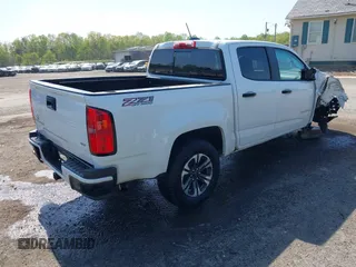2022 Chevrolet Colorado 4WD Z71 with VIN 1GCGTDEN2N1266879, listed as a IAAI auction lot 42036942 with 98,647 mi miles and . Bid and sale history available at DreamBid. Image 4.