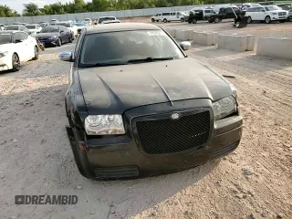 2007 Chrysler 300 with VIN 2C3LA43R17H879062, listed as a Copart auction lot 74536234 with 189,335 mi miles and Salvage Title. Bid and sale history available at carsss.com. Image 11.