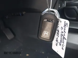 2022 Honda Odyssey Elite z VIN 5FNRL6H96NB039950, wystawiony jako IAAI lot #41907106 z przebiegiem 67 490 mil mil oraz . Historia ofert i sprzedaży dostępna na DreamBid. Obrazek 11.