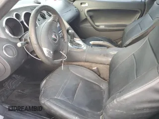 2009 Pontiac Solstice z VIN 1G2MN35B59Y107109, wystawiony jako Copart lot #76083734 z przebiegiem Nie podano mil oraz Nie do naprawy • Non repairable. Historia ofert i sprzedaży dostępna na DreamBid. Obrazek 7.