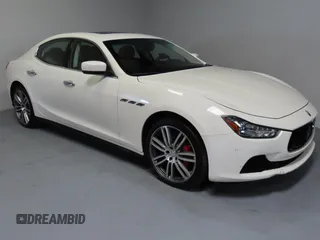 2014 Maserati Ghibli S Q4 z VIN ZAM57RTA7E1094580, wystawiony jako Copart lot #52009445 z przebiegiem 79 463 mil mil oraz Szkody całkowita. Historia ofert i sprzedaży dostępna na DreamBid. Obrazek 1.