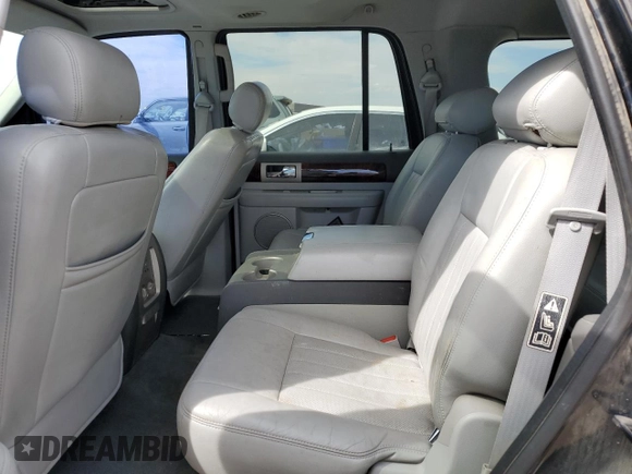 2004 Lincoln Navigator Luxury z VIN 5LMFU28R74LJ17939, wystawiony jako Copart lot #56915475 z przebiegiem 197 401 mil mil oraz Szkoda całkowita • Salvage title. Historia ofert i sprzedaży dostępna na DreamBid. Obrazek 11.