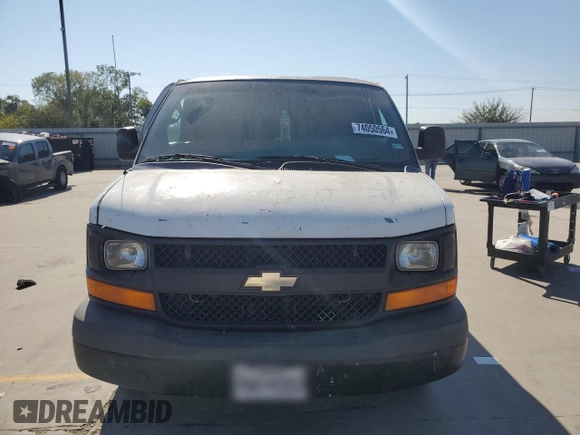 2014 Chevrolet Express Cargo Van with VIN 1GCWGGBA8E1197909, listed as a Copart auction lot 74050564 with 0 mi miles and Salvage Title. Bid and sale history available at carsss.com. Image 5.