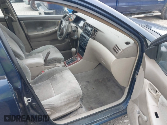 2004 Toyota Corolla CE with VIN 2T1BR32E44C261569, listed as a IAAI auction lot 42013805 with 299,999 mi miles and . Bid and sale history available at DreamBid. Image 5.