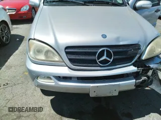 2004 Mercedes-Benz M-Class 3.5L with VIN 4JGAB57E24A463931, listed as a Copart auction lot 66799564 with 196,731 mi miles and Salvage Title. Bid and sale history available at carsss.com. Image 11.