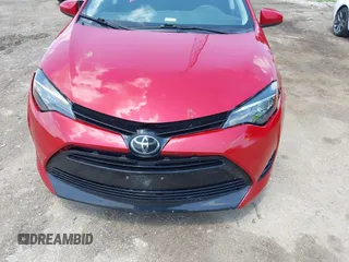 2018 Toyota Corolla L with VIN 2T1BURHE7JC105479, listed as a IAAI auction lot 42540566 with 67,487 mi miles and . Bid and sale history available at DreamBid. Image 21.