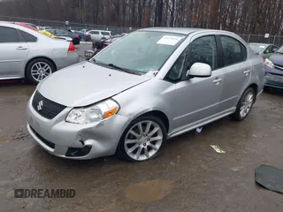 2011 Suzuki SX4 z VIN JS2YC5A41B6300385, wystawiony jako IAAI lot #41570810 z przebiegiem 117 847 mil mil oraz . Historia ofert i sprzedaży dostępna na DreamBid. Obrazek 17.
