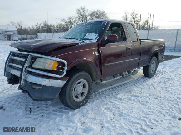 2000 Ford F-150 XL with VIN 1FTRX18L2YNA50128, listed as a IAAI auction lot 40956879 with 1 mi miles. Bid and sale history available at carsss.com. Image 16.
