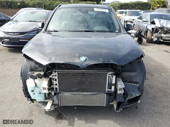 2018 BMW X1 sDrive28i with VIN WBXHU7C3XJ5L06006, listed as a Copart auction lot 47666595 with 56,142 mi miles and Salvage Title. Bid and sale history available at carsss.com. Image 5.
