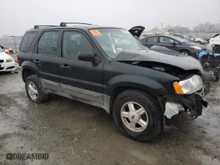 2003 Ford Escape XLS Popular with VIN 1FMYU021X3KA70123, listed as a Copart auction lot 86005514 with 0 mi miles and Salvage Title. Bid and sale history available at carsss.com. Image 4.