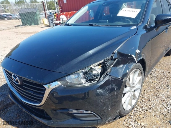 2017 Mazda Mazda3 4-Door Touring with VIN JM1BN1V74H1105829, listed as a IAAI auction lot 41753592 with 186,975 mi miles. Bid and sale history available at carsss.com. Image 6.