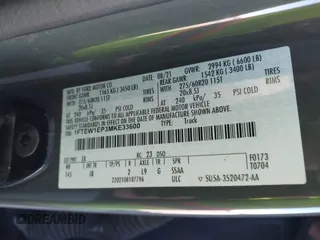 2021 Ford F-150 XL z VIN 1FTEW1EP3MKE33600, wystawiony jako IAAI lot #41053750 z przebiegiem 140 085 mil mil oraz . Historia ofert i sprzedaży dostępna na DreamBid. Obrazek 9.