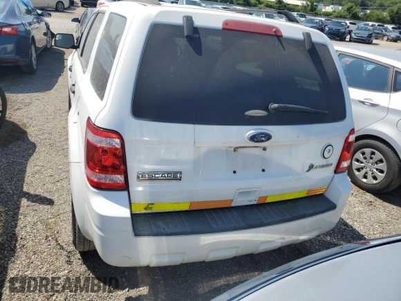 2011 Ford Escape Hybrid z VIN 1FMCU5K36BKB48839, wystawiony jako Copart lot #69024034 z przebiegiem 110 100 mil mil oraz Czysty tytuł • Clean title. Historia ofert i sprzedaży dostępna na DreamBid. Obrazek 6.