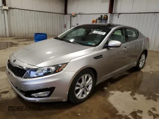 2011 Kia Optima EX z VIN KNAGN4A74B5171520, wystawiony jako Copart lot #52552335 z przebiegiem 74 259 mil mil oraz Szkoda całkowita • Salvage title. Historia ofert i sprzedaży dostępna na DreamBid. Obrazek 1.