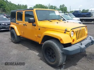 2013 Jeep Wrangler Unlimited Sahara with VIN 1C4HJWEG5DL560447, listed as a IAAI auction lot 42713079 with 126,650 mi miles and . Bid and sale history available at DreamBid. Image 1.