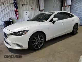 2016 Mazda 6 i Grand Touring с VIN JM1GJ1W59G1416864, выставлен на аукционе Copart как лот 49164285 с пробегом 94 074 миль миль и Чистый • Clean title. История ставок и продаж доступна на DreamBid. Изображение 1.