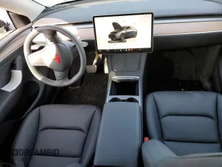 2025 Tesla Model Y Long Range with VIN 7SAYGDEE4SF291068, listed as a Copart auction lot 51204615 with 2,958 mi miles and Salvage Title. Bid and sale history available at DreamBid. Image 8.