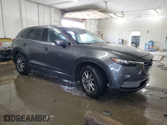 2017 Mazda CX-9 Touring with VIN JM3TCBCY5H0134295, listed as a Copart auction lot 63448185 with 174,248 mi miles and Salvage title. Bid and sale history available at DreamBid. Image 4.