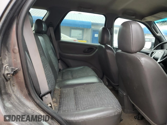 2002 Ford Escape XLS Choice with VIN 1FMYU02102KB67376, listed as a Copart auction lot 79109394 with 234,306 mi miles and Salvage title. Bid and sale history available at DreamBid. Image 11.
