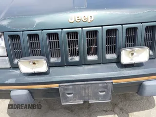 1993 Jeep Grand Cherokee Limited z VIN 1J4GZ78Y7PC531299, wystawiony jako IAAI lot #42117795 z przebiegiem 168 995 mil mil oraz . Historia ofert i sprzedaży dostępna na DreamBid. Obrazek 6.