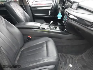 2015 BMW X5 xDrive35i with VIN 5UXKR0C54F0P00889, listed as a IAAI auction lot 42023099 with 196,387 mi miles. Bid and sale history available at carsss.com. Image 5.