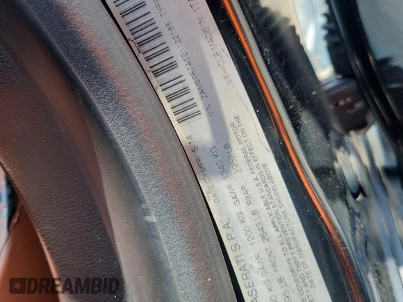 2014 Maserati Ghibli S Q4 with VIN ZAM57RTA5E1122165, listed as a Copart auction lot 60257835 with Not provided miles and Salvage title. Bid and sale history available at DreamBid. Image 12.