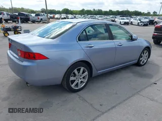 2004 Acura TSX w/Navigation with VIN JH4CL96944C045735, listed as a IAAI auction lot 42042197 with 197,900 mi miles. Bid and sale history available at carsss.com. Image 4.