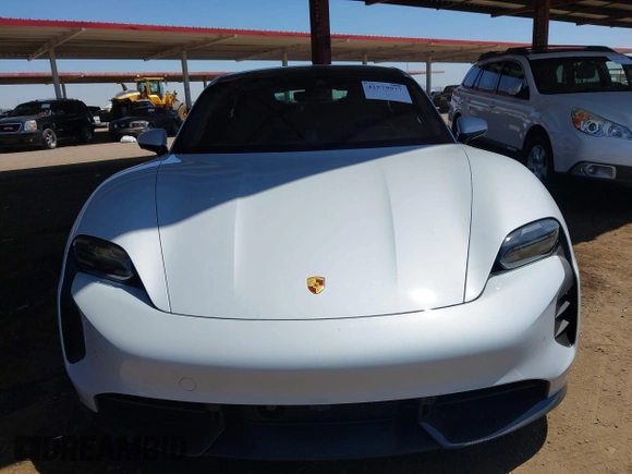2021 Porsche Taycan Turbo z VIN WP0AC2Y1XMSA63835, wystawiony jako IAAI lot #42579977 z przebiegiem 5 841 mil mil oraz . Historia ofert i sprzedaży dostępna na DreamBid. Obrazek 6.