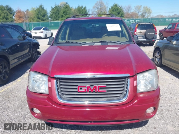2002 GMC Envoy SLT with VIN 1GKDS13S922205147, listed as a IAAI auction lot 42041118 with 127,400 mi miles. Bid and sale history available at carsss.com. Image 6.