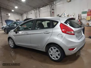 2011 Ford Fiesta SE with VIN 3FADP4EJ8BM138140, listed as a IAAI auction lot 41858510 with 38,475 mi miles. Bid and sale history available at carsss.com. Image 3.