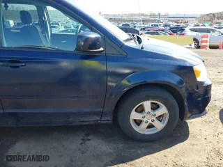 2013 Dodge Grand Caravan SXT with VIN 2C4RDGCGXDR527973, listed as a IAAI auction lot 41930036 with 111,985 mi miles. Bid and sale history available at carsss.com. Image 6.