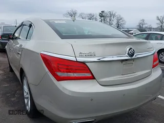 2014 Buick LaCrosse Leather with VIN 1G4GB5G39EF291832, listed as a IAAI auction lot 42023142 with 80,848 mi miles and . Bid and sale history available at DreamBid. Image 3.
