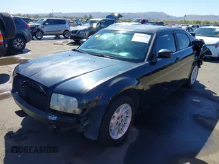 2007 Chrysler 300 with VIN 2C3KA43R47H888706, listed as a IAAI auction lot 41849210 with 135,156 mi miles. Bid and sale history available at carsss.com. Image 18.