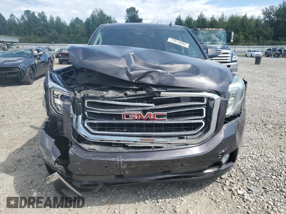 2015 GMC Yukon SLT z VIN 1GKS1BKC4FR274240, wystawiony jako Copart lot #72913884 z przebiegiem 132 096 mil mil oraz Szkoda całkowita • Salvage title. Historia ofert i sprzedaży dostępna na DreamBid. Obrazek 5.