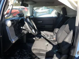 2011 Toyota FJ Cruiser with VIN JTEBU4BF1BK102982, listed as a Copart auction lot 47958985 with 215,418 mi miles and Salvage Title. Bid and sale history available at carsss.com. Image 7.