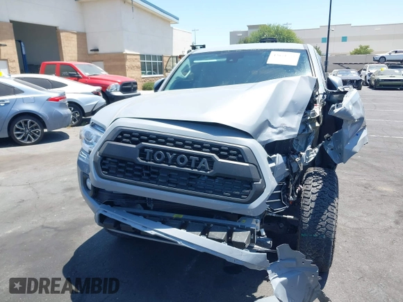 2020 Toyota Tacoma SR5 with VIN 3TMBZ5DN7LM025500, listed as a IAAI auction lot 42651731 with 54,879 mi miles and . Bid and sale history available at DreamBid. Image 13.