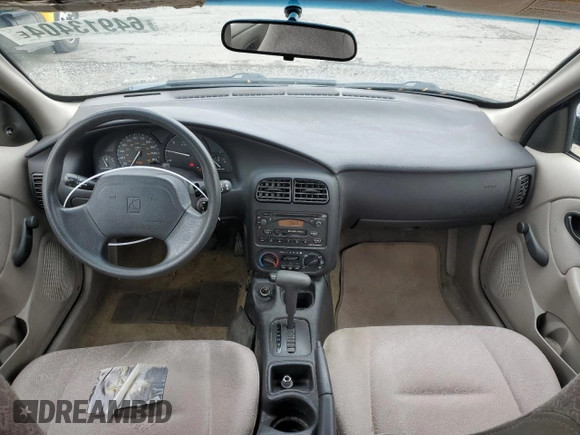 2000 Saturn SL z VIN 1G8ZH528XYZ160128, wystawiony jako Copart lot #64913404 z przebiegiem 172 587 mil mil oraz Czysty tytuł • Clean title. Historia ofert i sprzedaży dostępna na DreamBid. Obrazek 8.