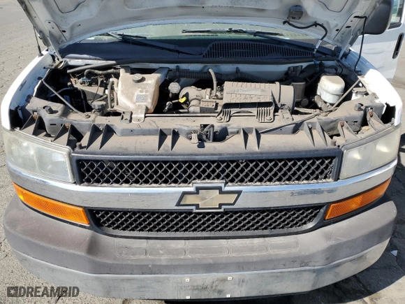 2012 Chevrolet Express Passenger 1LT with VIN 1GAZG1FG4C1100252, listed as a Copart auction lot 73242444 with 76,779 mi miles and Salvage Title. Bid and sale history available at carsss.com. Image 12.